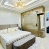 Master bedroom in Aggersen Enclave with LED panels and full-size wardrobe space