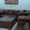 Spacious furnished living room with sofa set and AC in 4BHK flat at GHB Splande Zirakpur