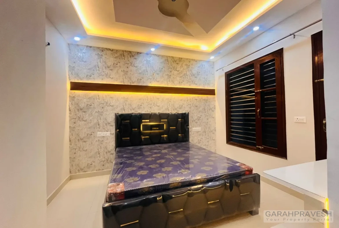 Master bedroom with premium wooden wardrobe and designer lighting