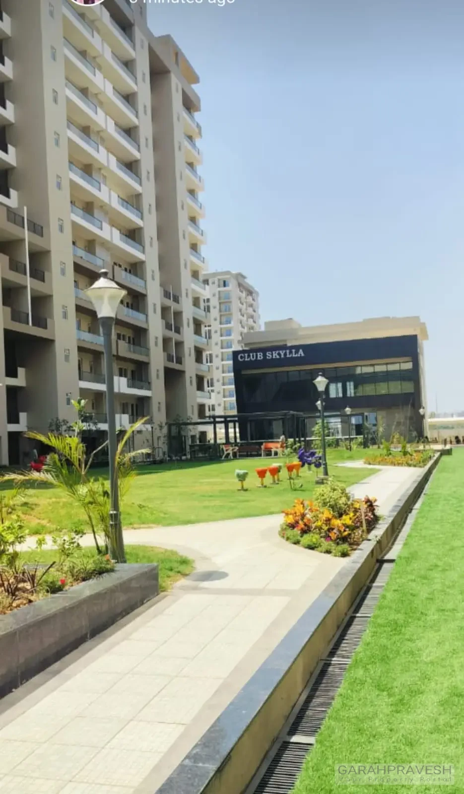 Luxury 4+1BHK apartments at Uptown Skylla Zirakpur with modern glass facade and landscaped gardens