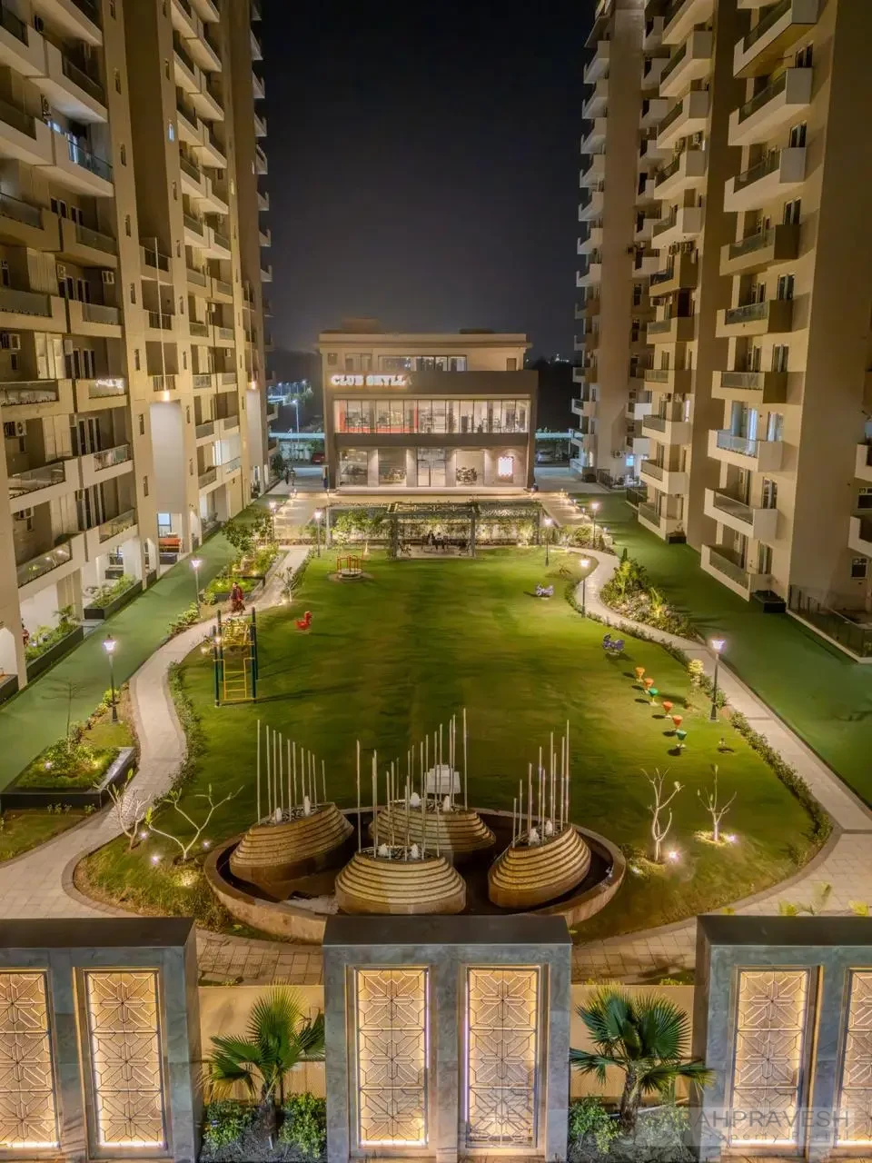 Luxury 4+1BHK apartments at Uptown Skylla Zirakpur with modern glass facade and landscaped gardens