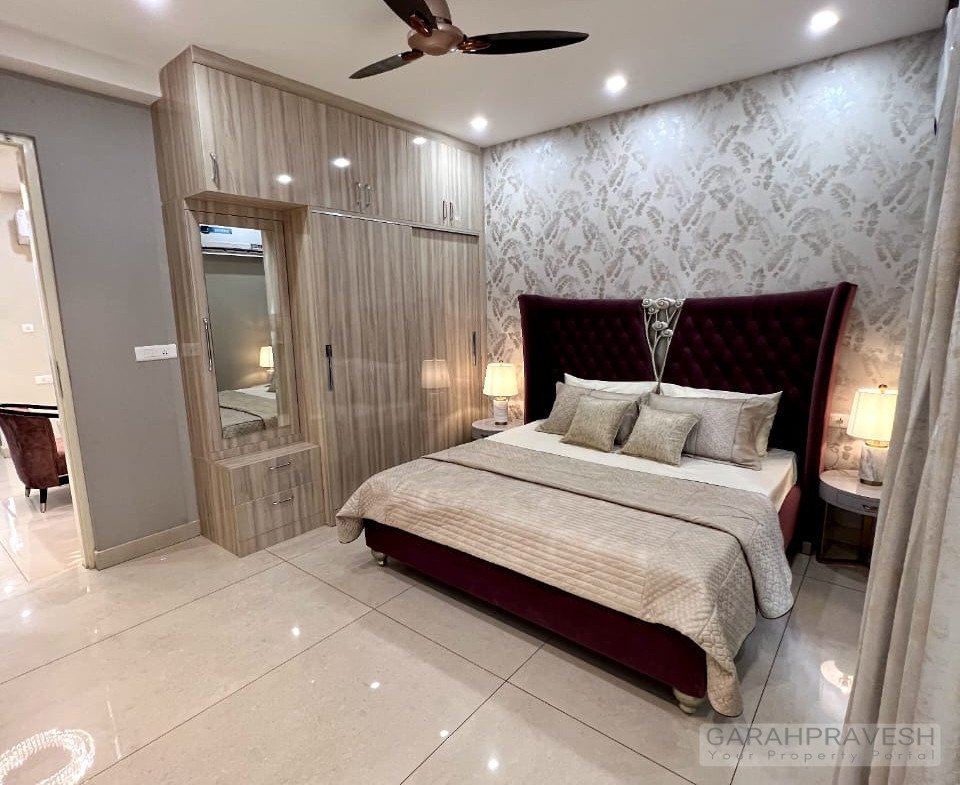 Fully furnished 3BHK designer flat for sale in Zirakpur with brand new furniture, lift access, modular kitchen, and spacious layout in a gated society near Patiala Road.