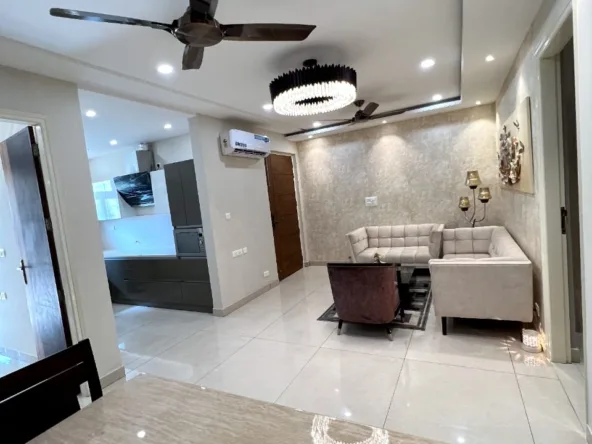 Fully furnished 3BHK designer flat for sale in Zirakpur with brand new furniture, lift access, modular kitchen, and spacious layout in a gated society near Patiala Road.