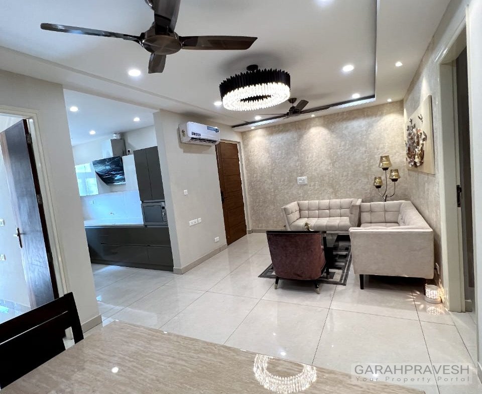 Fully furnished 3BHK designer flat for sale in Zirakpur with brand new furniture, lift access, modular kitchen, and spacious layout in a gated society near Patiala Road.