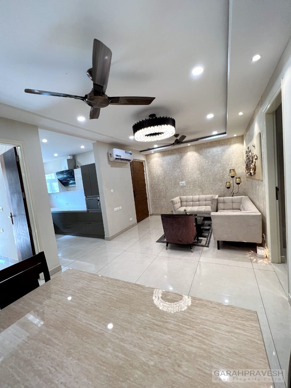Fully furnished 3BHK designer flat for sale in Zirakpur with brand new furniture, lift access, modular kitchen, and spacious layout in a gated society near Patiala Road.