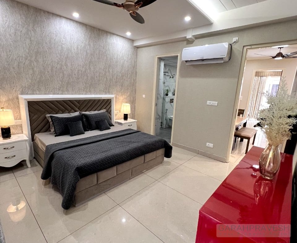 Fully furnished 3BHK designer flat for sale in Zirakpur with brand new furniture, lift access, modular kitchen, and spacious layout in a gated society near Patiala Road.
