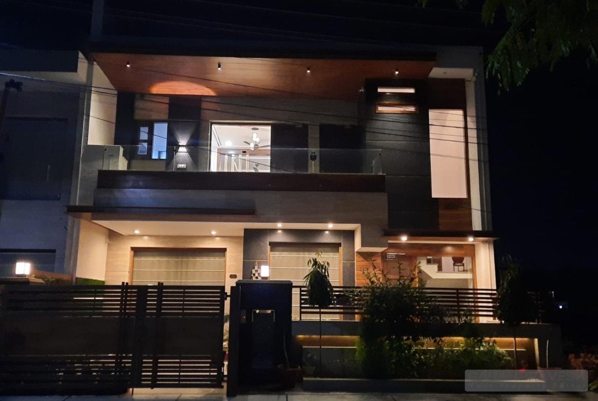 Luxury 10 Marla 5BHK Villa for Sale in Sector 79 Mohali – double storey independent house, park-facing, 6 car parking, modern facade with premium teak wood and Jaguar fittings.