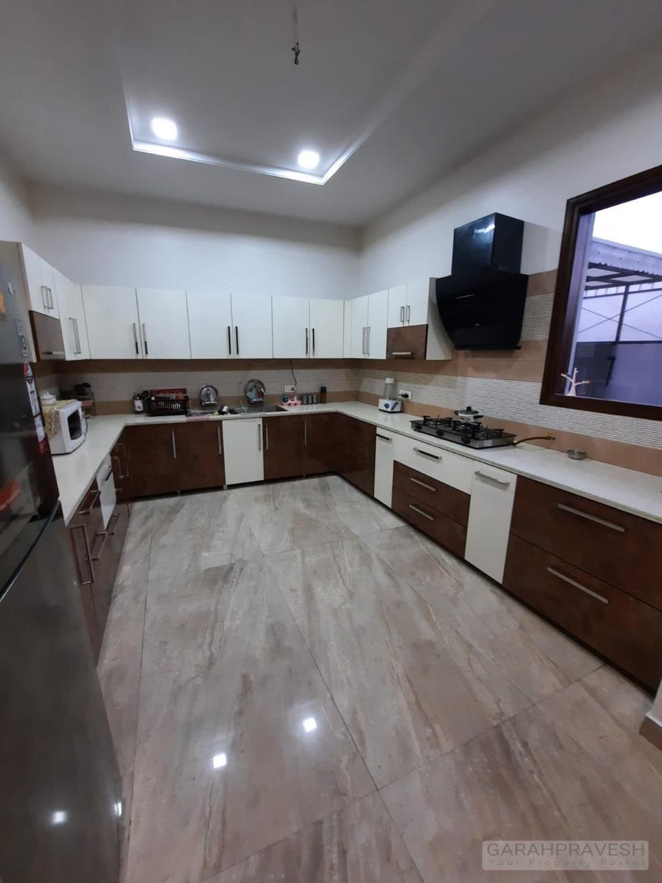 Luxury 10 Marla 5BHK Villa for Sale in Sector 79 Mohali – double storey independent house, park-facing, 6 car parking, modern facade with premium teak wood and Jaguar fittings.