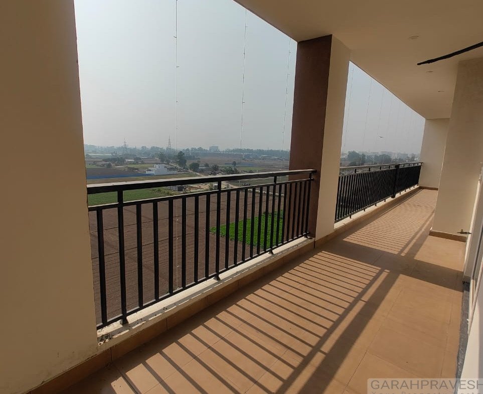 3 and 4 BHK luxury apartments for sale in Hi-Greens Dhakoli Zirakpur near PR7 Airport Road with forest view balconies, rooftop swimming pool and modern clubhouse amenities