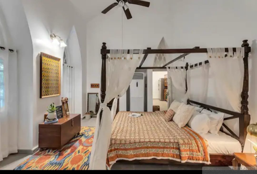 4BHK luxury villa for sale in Nerul North Goa with 14x7m private pool, Portuguese architecture, 1310 sqm standalone estate near Coco Beach