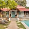 4BHK luxury villa for sale in Nerul North Goa with 14x7m private pool, Portuguese architecture, 1310 sqm standalone estate near Coco Beach