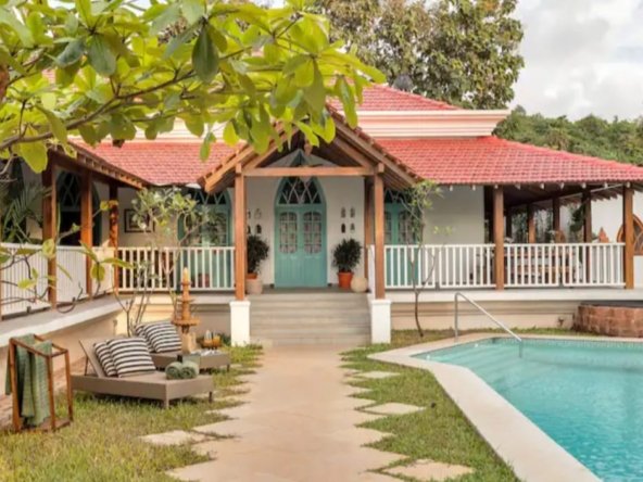 4BHK luxury villa for sale in Nerul North Goa with 14x7m private pool, Portuguese architecture, 1310 sqm standalone estate near Coco Beach