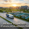 A high-end, wide-angle cinematic architectural photograph of a massive, modern industrial park in Mohali during a golden hour sunset. A sleek logistics freight truck drives on a wide, pristine concrete expressway in the foreground. To the right, neat industrial plots are outlined with glowing blue digital borders labeled "RERA VERIFIED PLOT 12, 14, and 16" in crisp white text. The background features manicured green lawns, LED streetlights, and state-of-the-art corporate and manufacturing facilities like "Technovate Biotech" and "Global MFG". Metallic-embossed 3D text in the lower third reads: "READY TO MOVE: The Future of Business Setup."
